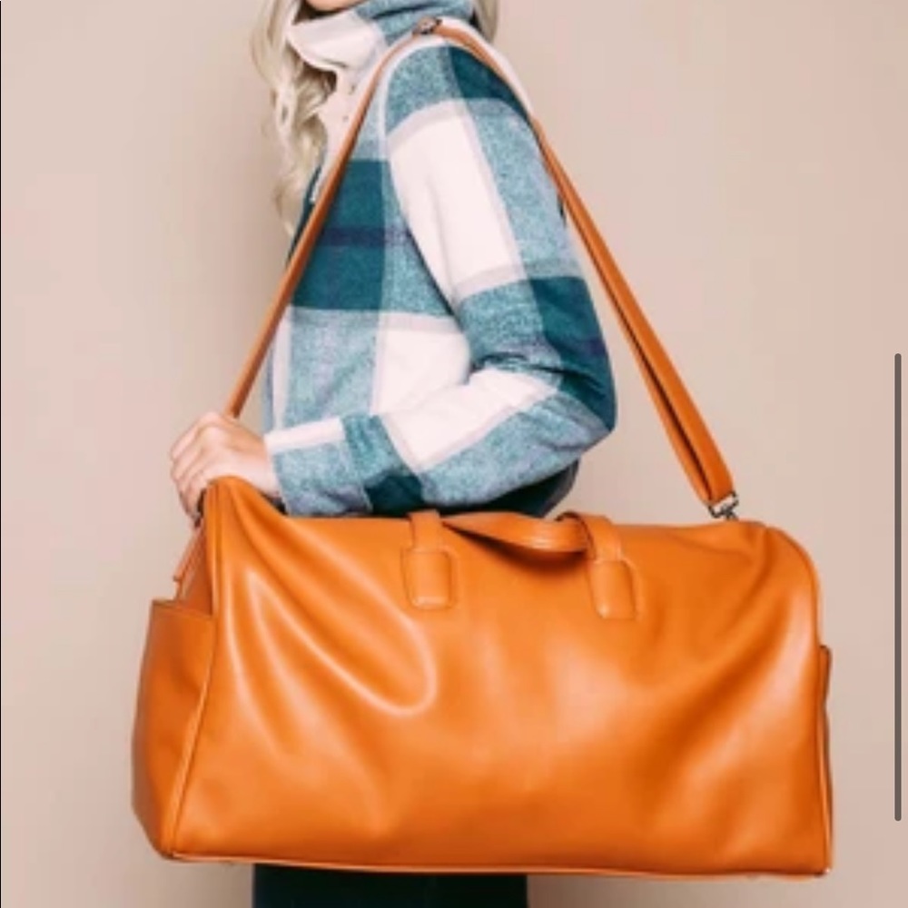 Brown duffel bag.